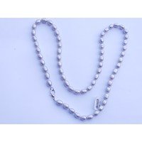 Collana in perle vere grigie ovali con moschettone argentato 
