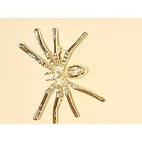 Spilla a forma di ragno argentato con swarovski bianchi